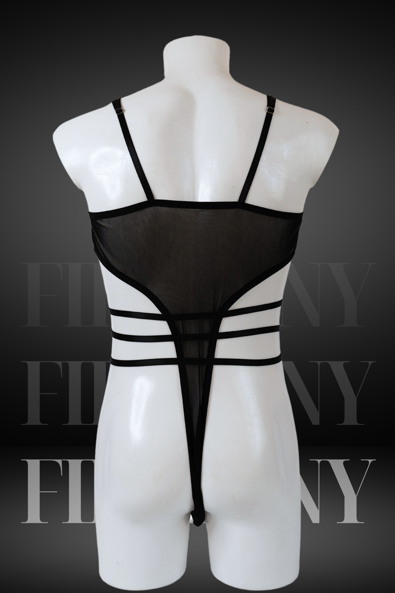 Angled side view of black mesh bodysuit for femboys and gay men with O-ring waist detail, on mannequin.