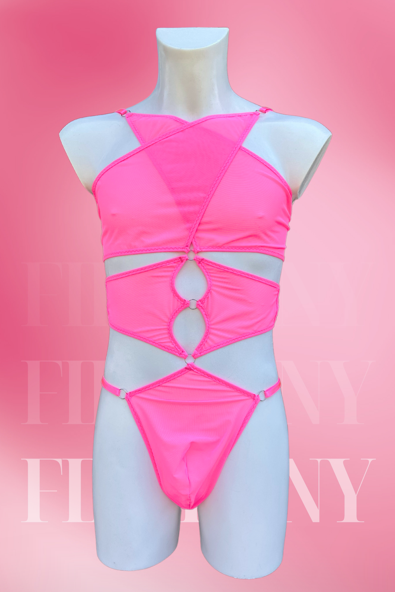 Front view of pink cut-out mesh bodysuit for men with O-rings and strappy design