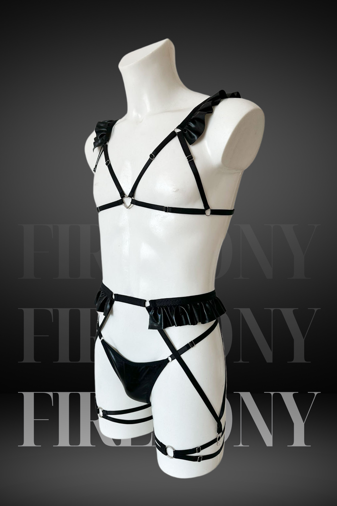 Side view of men’s faux leather harness set with thong and adjustable straps