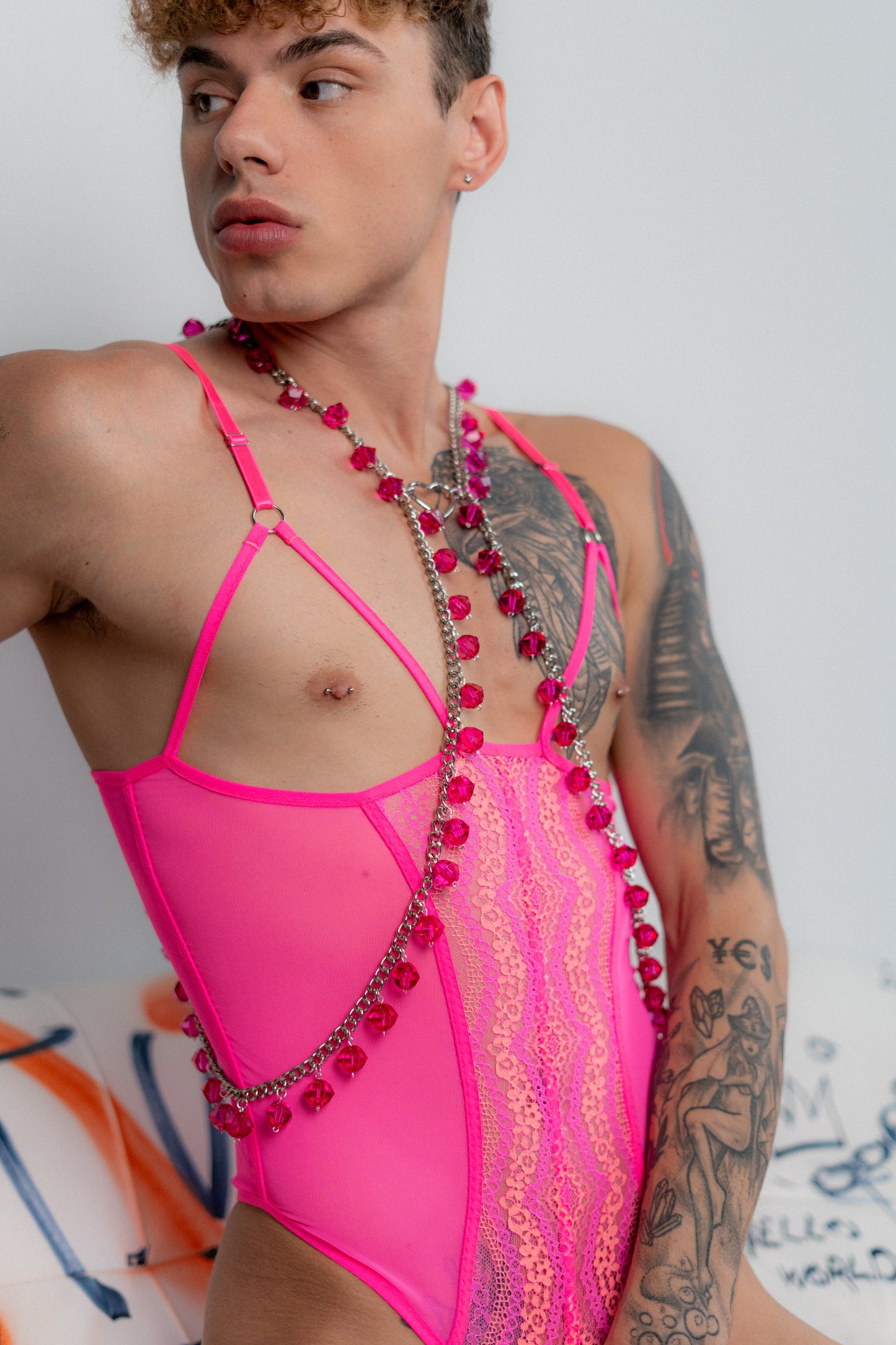 Men’s body chain harness adorned with pink crystals, a bold accessory by Fireponyshop