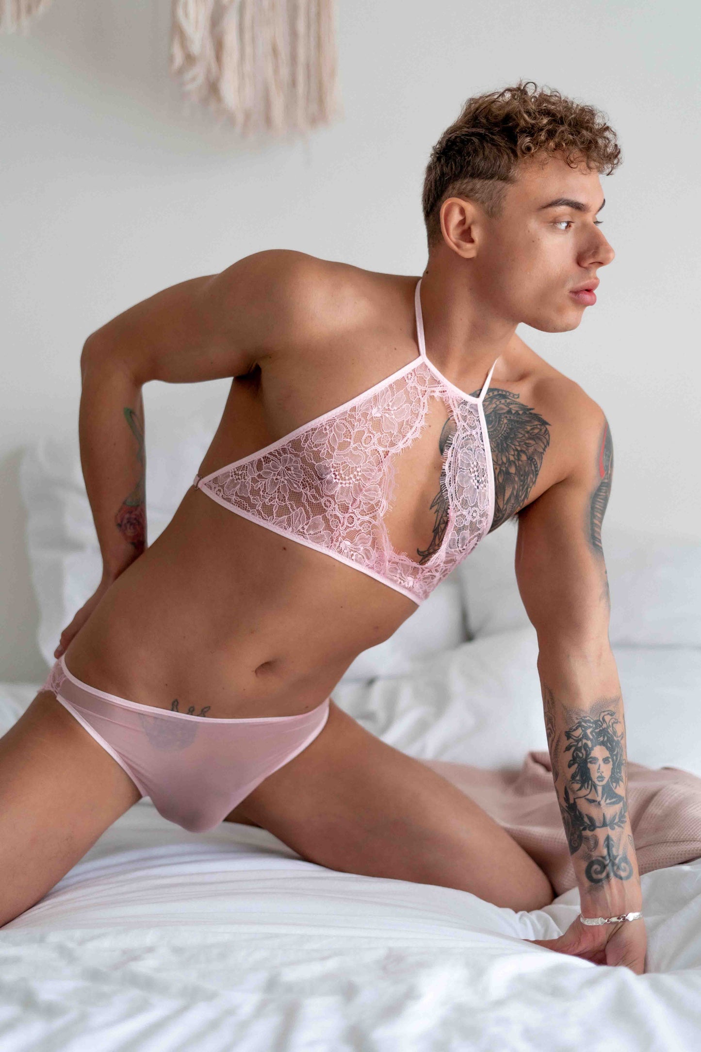 Pink lace men's panties from Fireponyshop’s feminine underwear collection, designed for comfort and style.