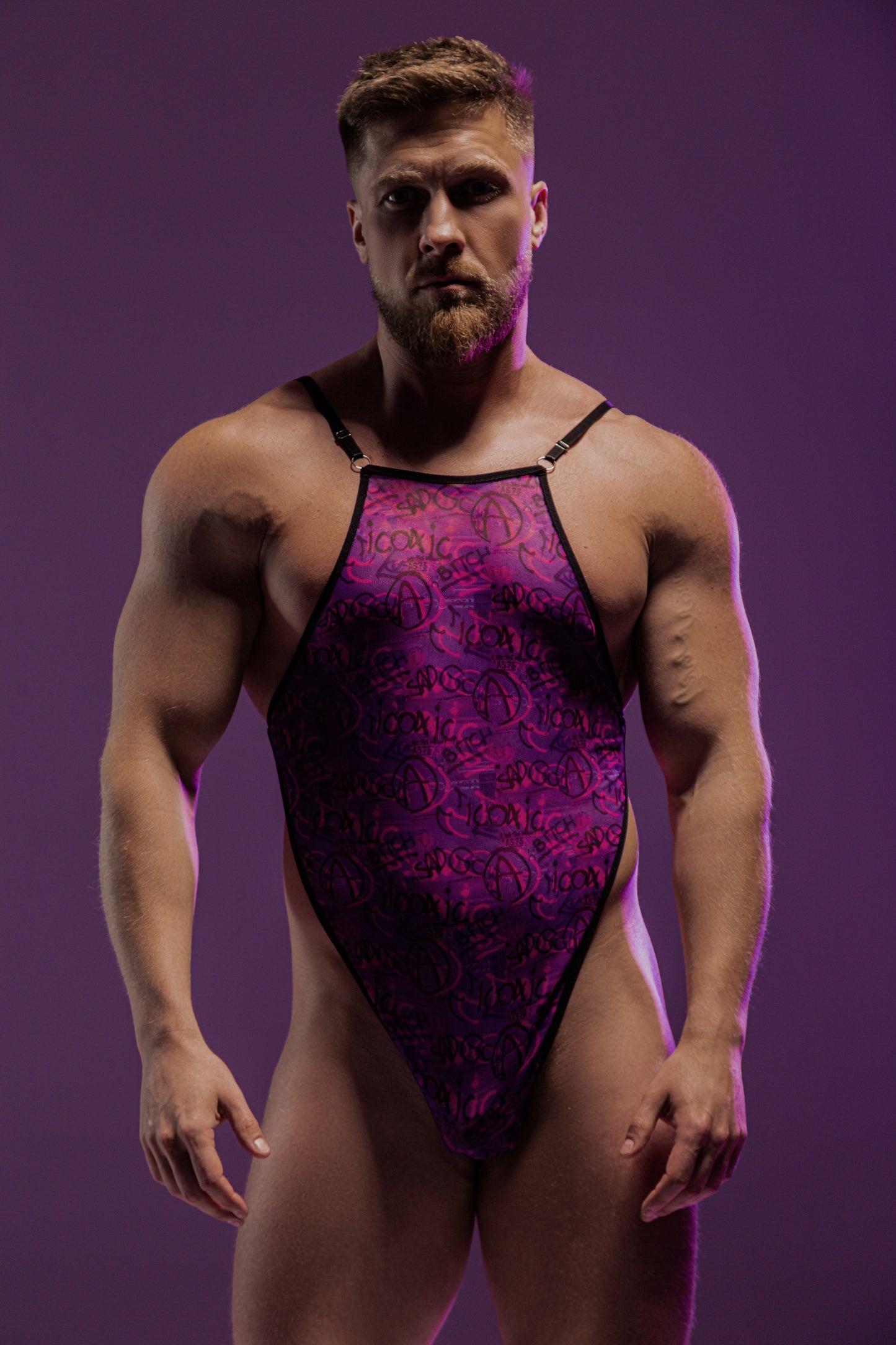 Close-up of graffiti print on purple mesh bodysuit