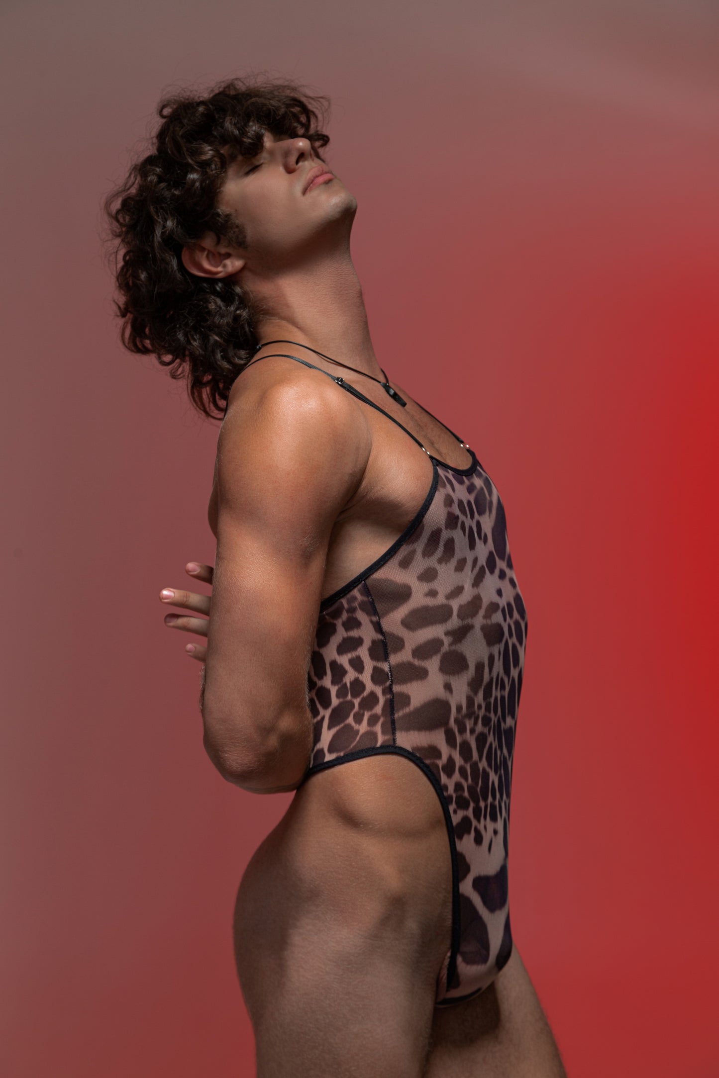 Men's thong bodysuit in leopard mesh print – stylish and daring