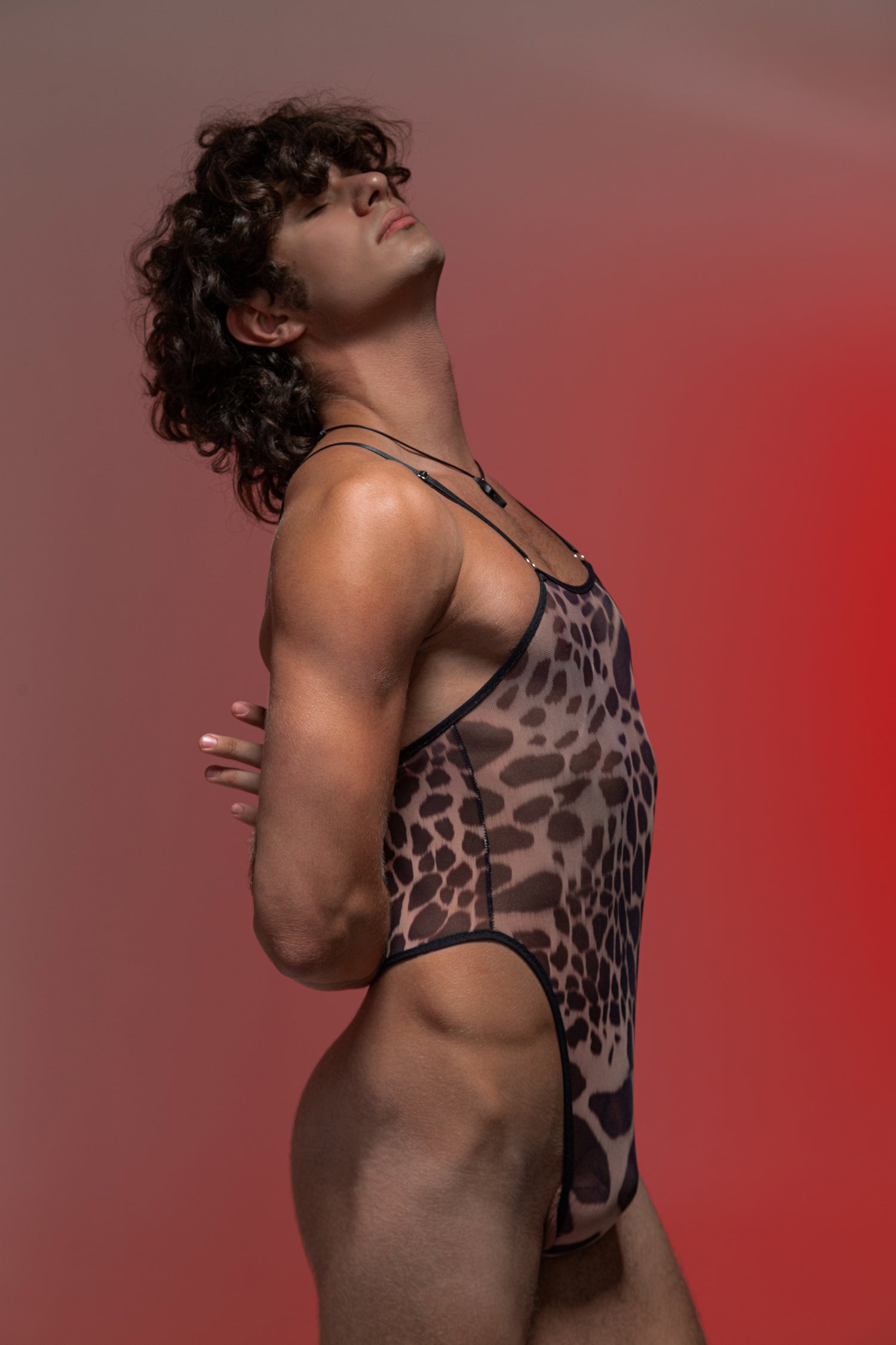Men's thong bodysuit in leopard mesh print – stylish and daring