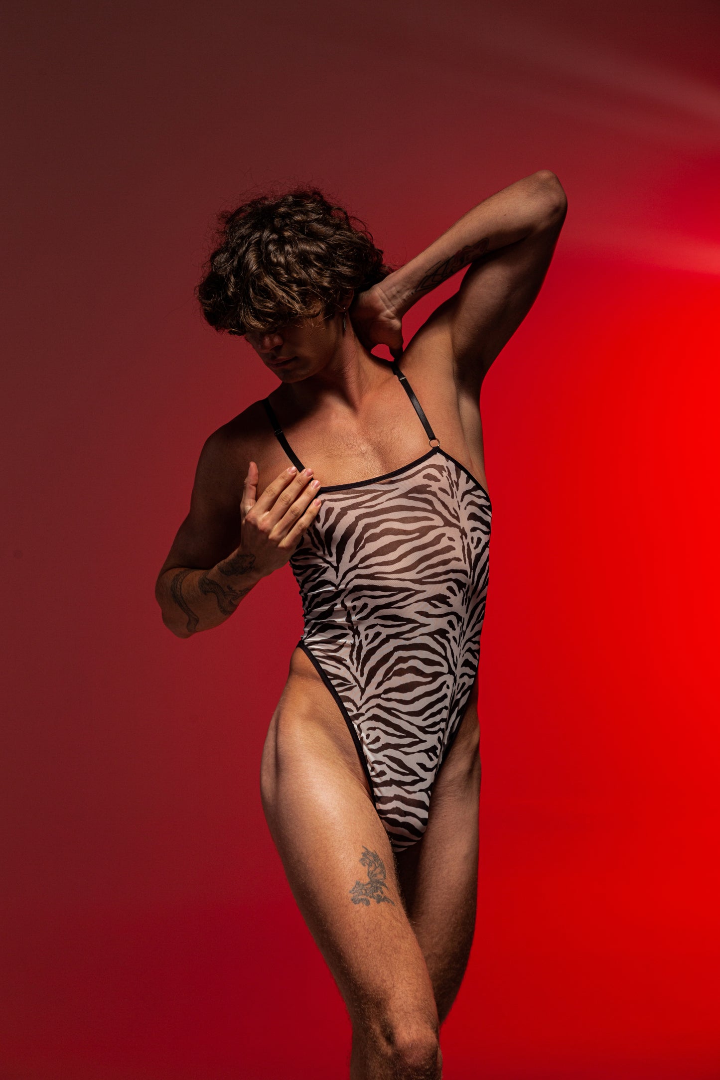 Men's sheer zebra print bodysuit – bold and daring nightclub outfit