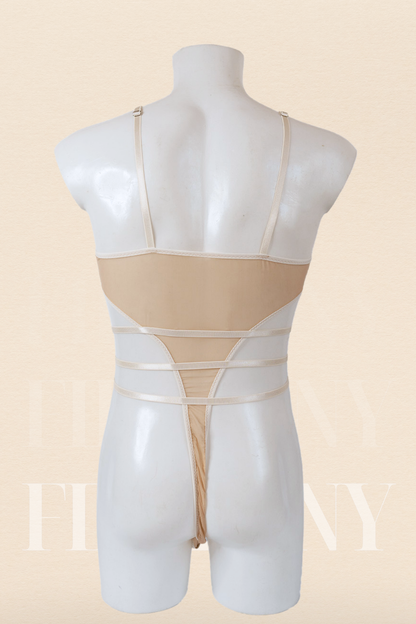 Back view of nude sheer men’s bodysuit with thong back and multiple waist straps.

