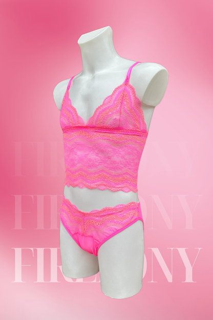 Angled back view of the lace bralette and panties set for men in vibrant pink.

