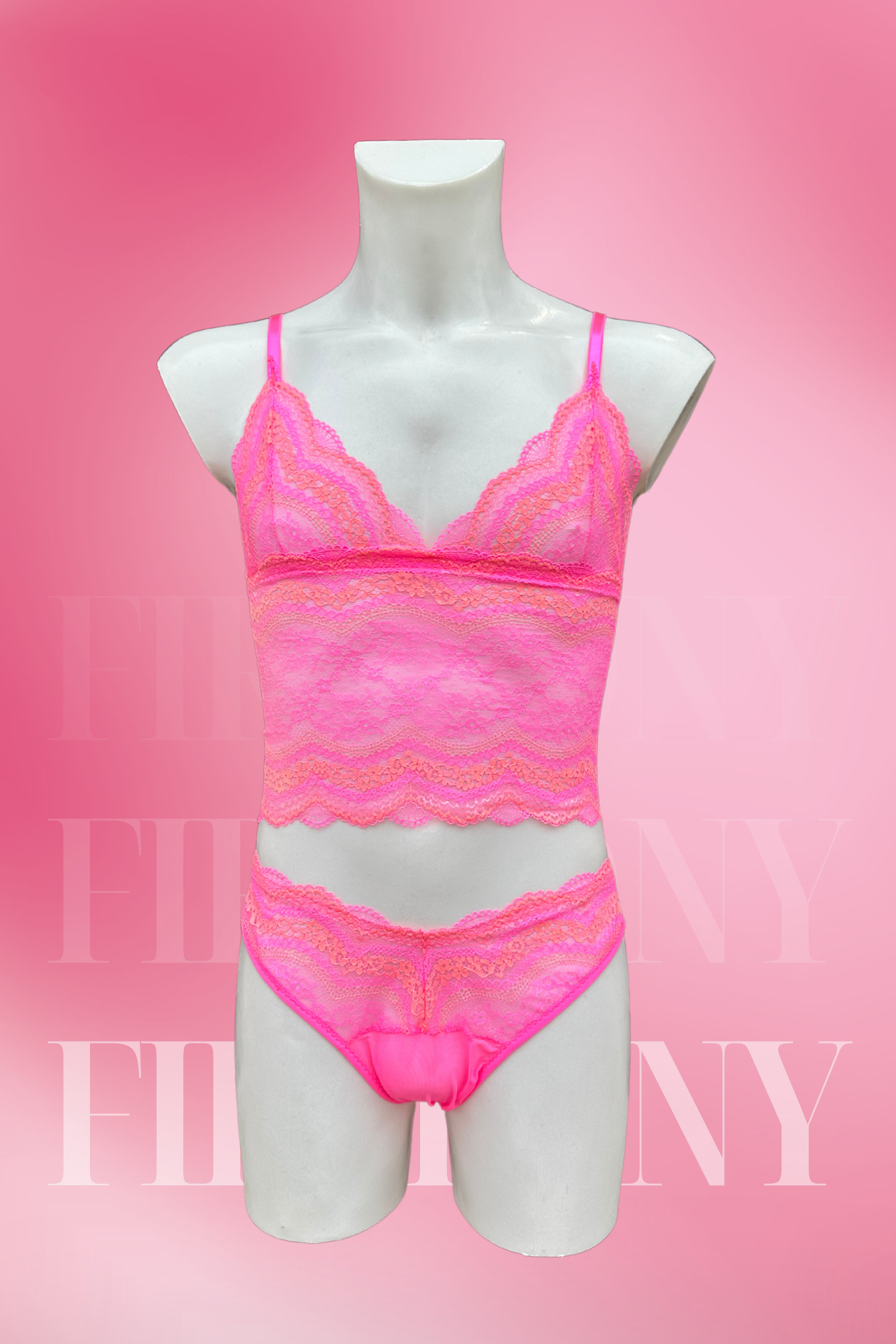 Side view of a hot pink lace femboy lingerie set with a cropped lace bralette and matching panties on a male mannequin.