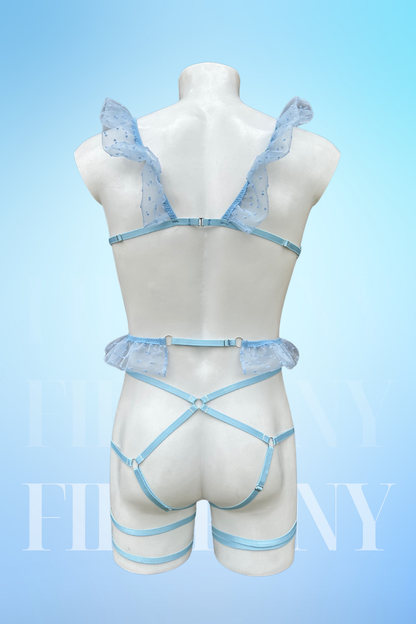 Back view of the lingerie set highlighting the thong design and ruffled shoulder straps.