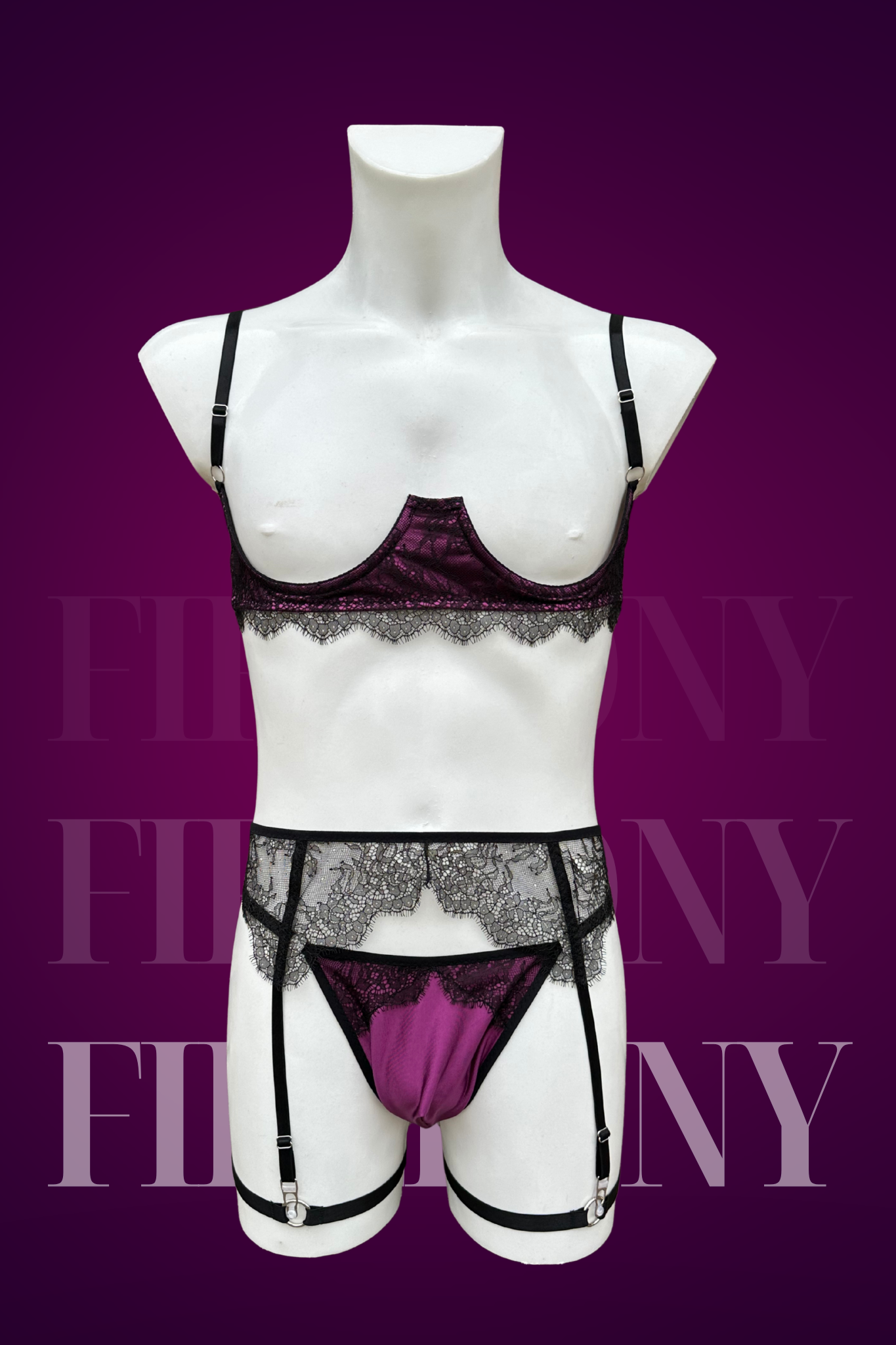 Purple satin and black lace men’s lingerie set featuring an open cup bra, garter belt, and thong displayed on a mannequin, front and back views.

