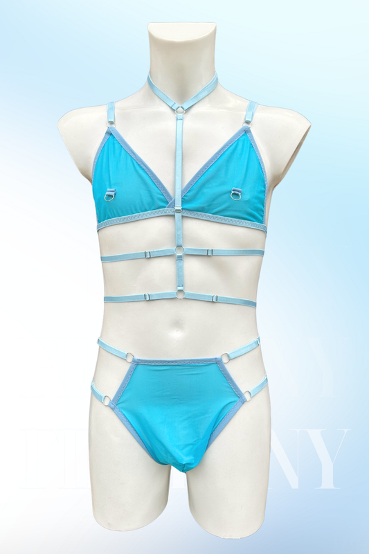 Light blue men's harness lingerie set with strappy bralette and matching panties, front view on mannequin.
