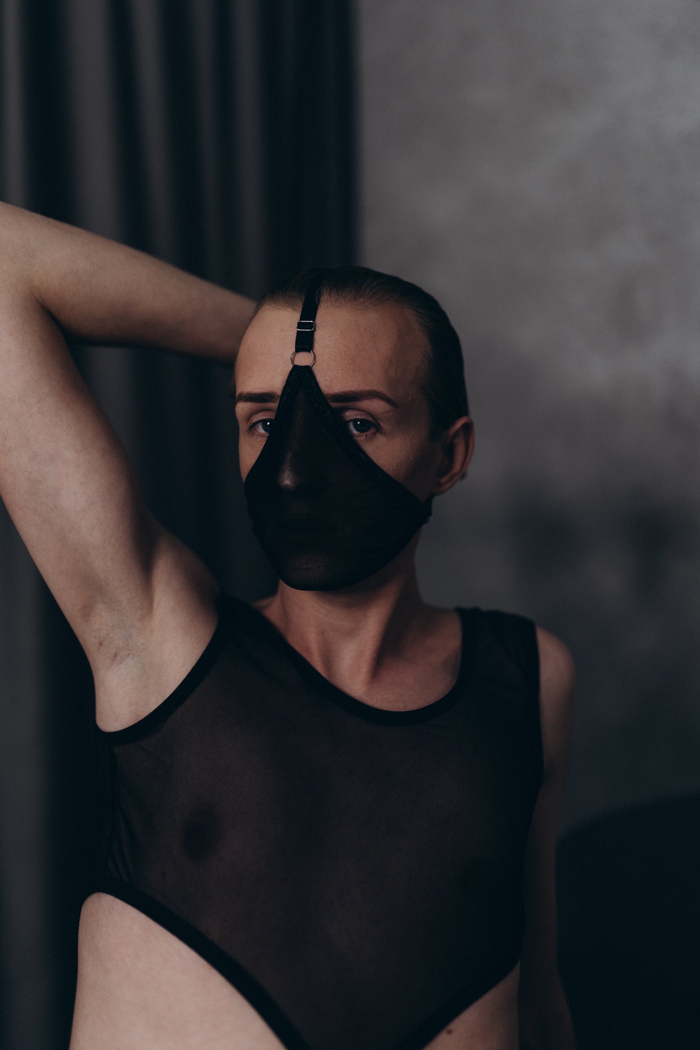 Men’s black mesh face mask for BDSM and fetish wear, crafted by Fireponyshop.