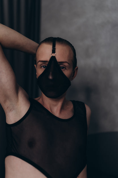 Men’s fetish face mask in black mesh, adding a daring and bold look by Fireponyshop