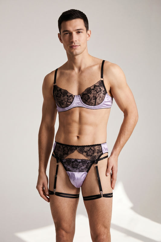 Lavender satin and black lace lingerie set for men on a model: underwire bra, thong and garter belt with thigh straps