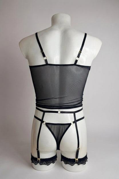 Back view of men's black mesh corset top set - sheer top, thong back and adjustable suspender straps