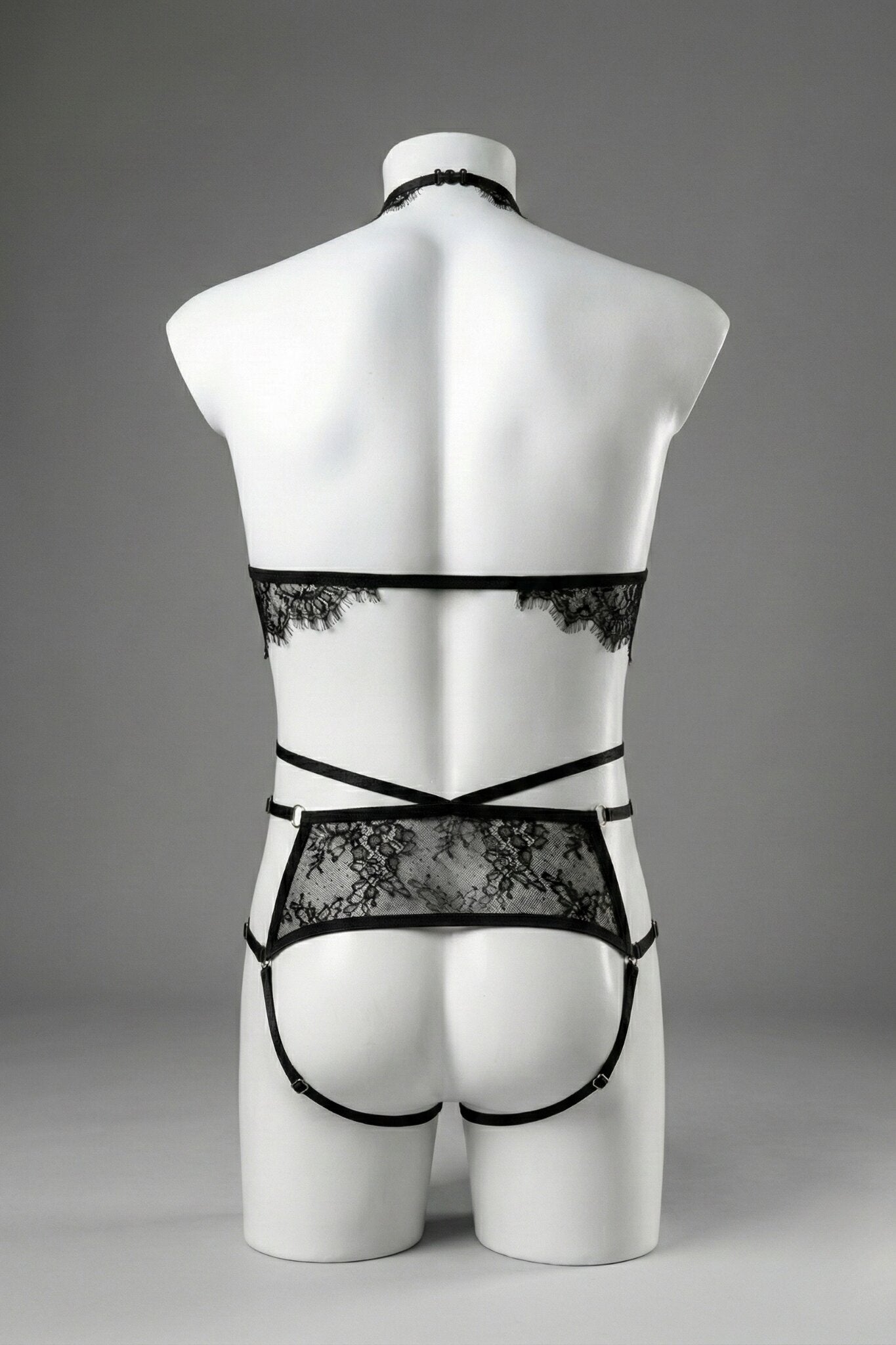 Back view of men's black lace ouvert set - lace back panel, open cut and adjustable straps