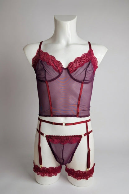 Burgundy corset-style mesh top set for men on mannequin - plum mesh with wine lace trim and gold hardware, front view