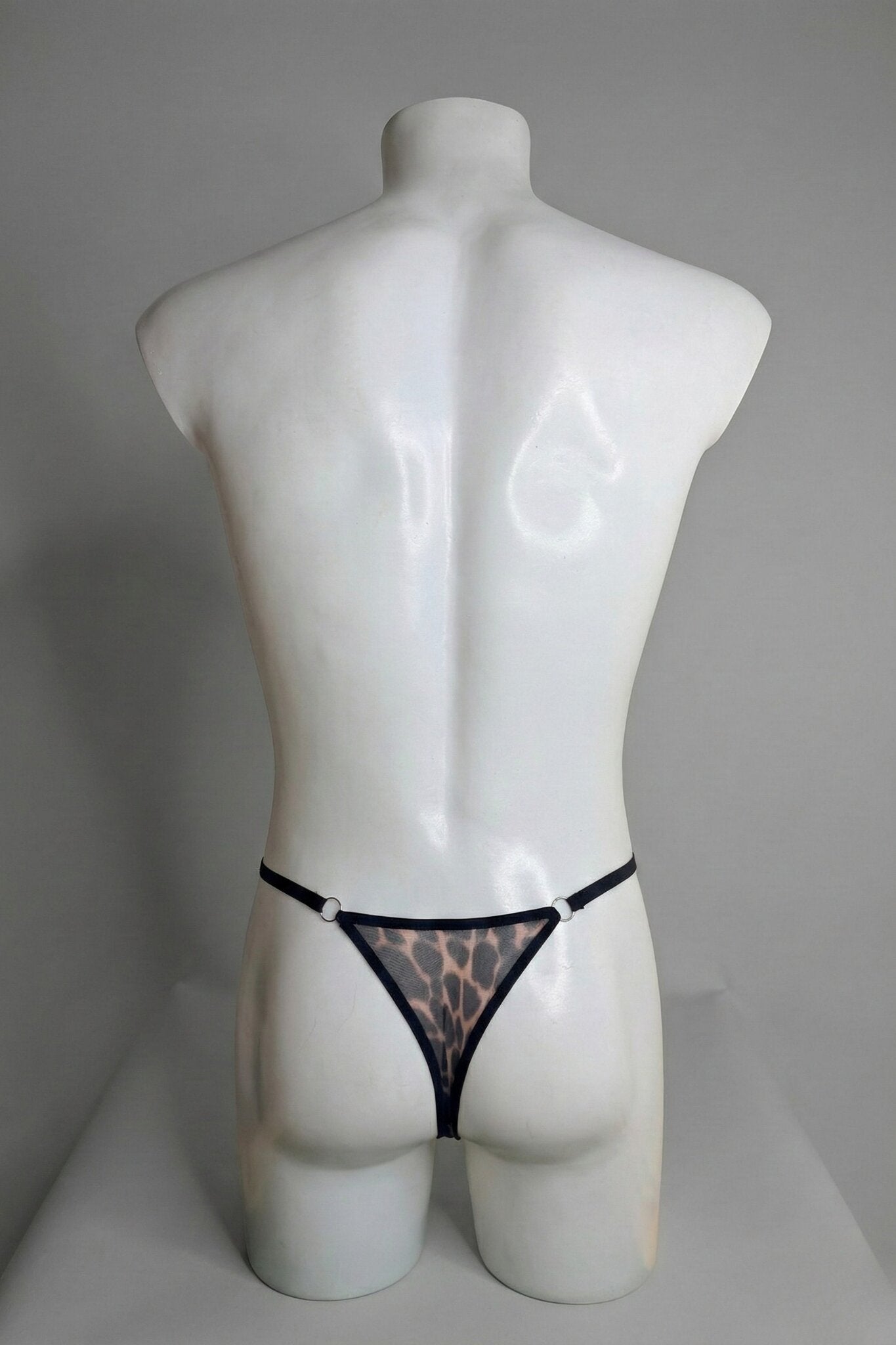 Back view of men's leopard mesh thong - classic thong back with adjustable black waist straps