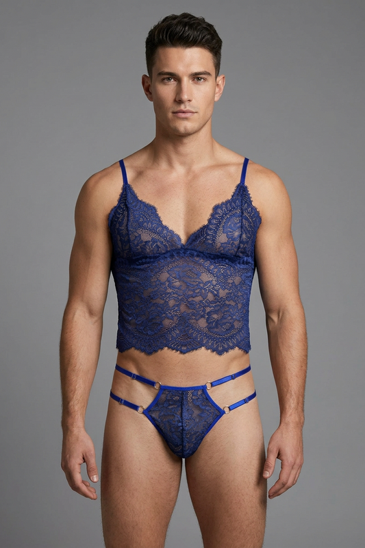 Man wearing a blue lace lingerie set against a gray background