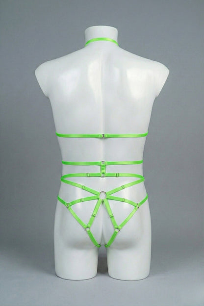 Back view of men's neon green strappy body harness set - crossing waist straps and open-frame back with o-rings