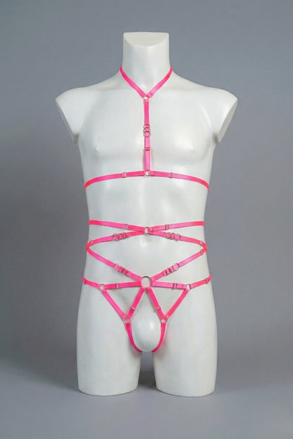 Hot pink strappy body harness set for men on mannequin - choker harness top and open-frame harness bottom with silver o-rings, front view