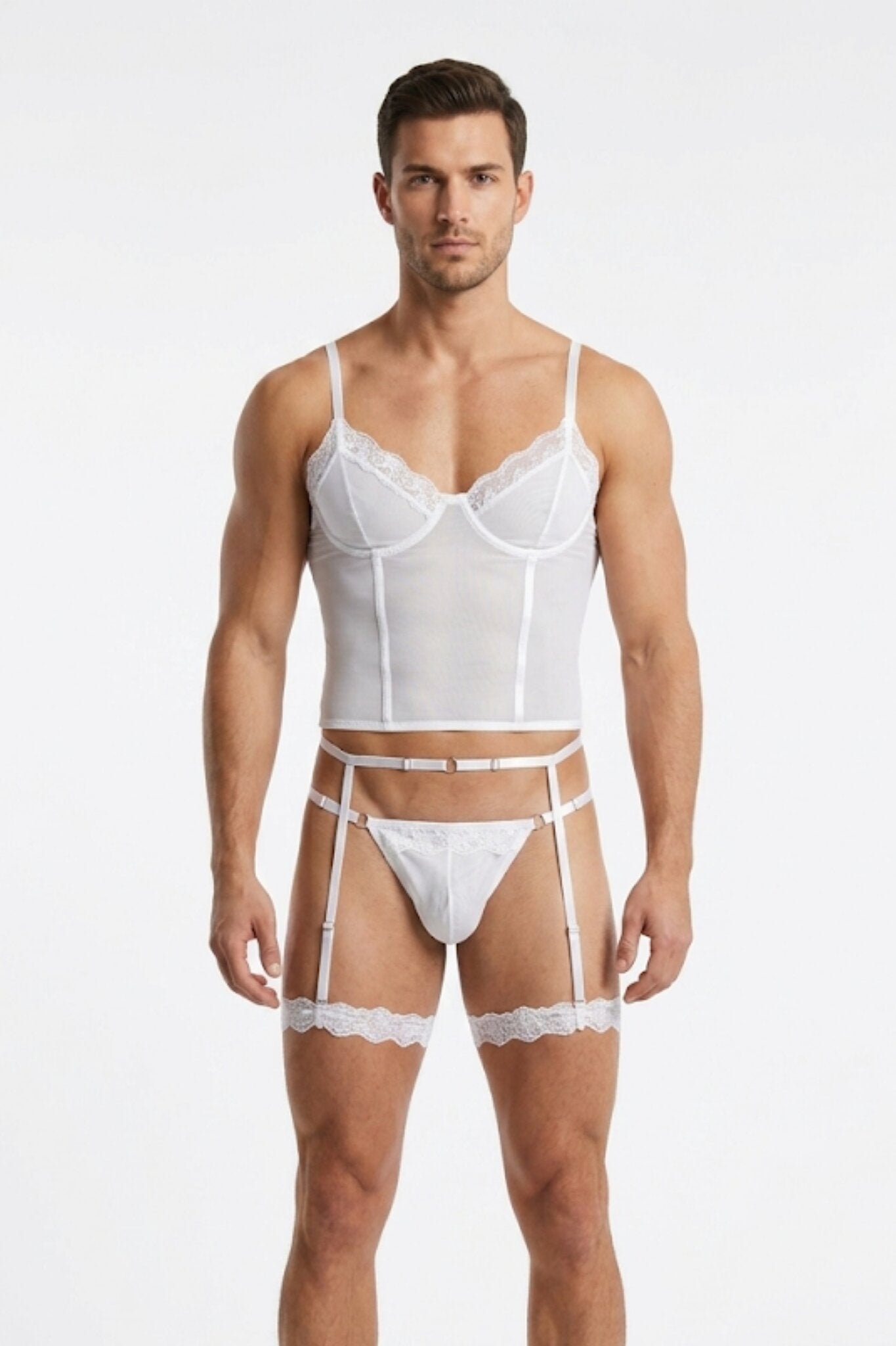 Man wearing white mesh corset top lingerie set for men - sheer cami top, thong, garter belt and lace leg garters by Fire Pony