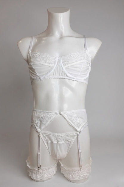White lace lingerie set for men on mannequin - sheer bra, thong, garter belt and lace leg garters, front view
